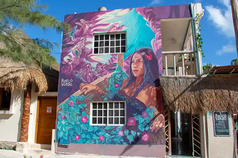 The colorfully painted facade of Barco Verde Hostel.